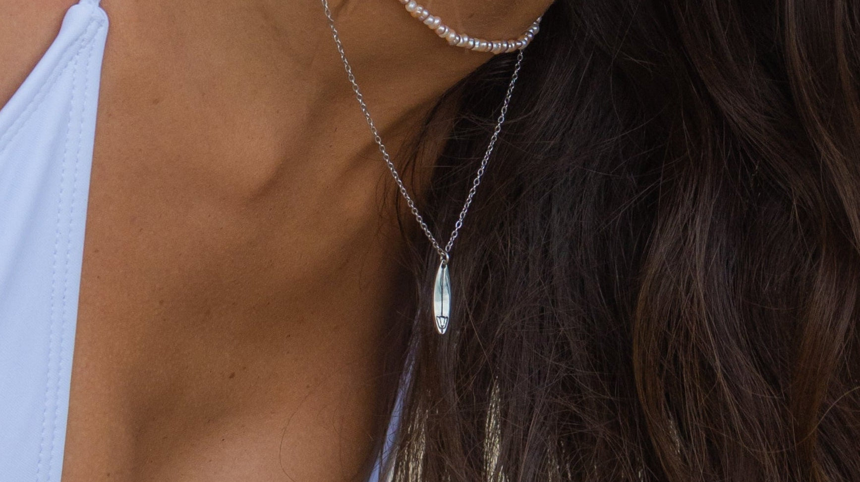 Ocean Inspired Shortboard Necklace: A Surf Culture Symbol You Can Wear Anywhere