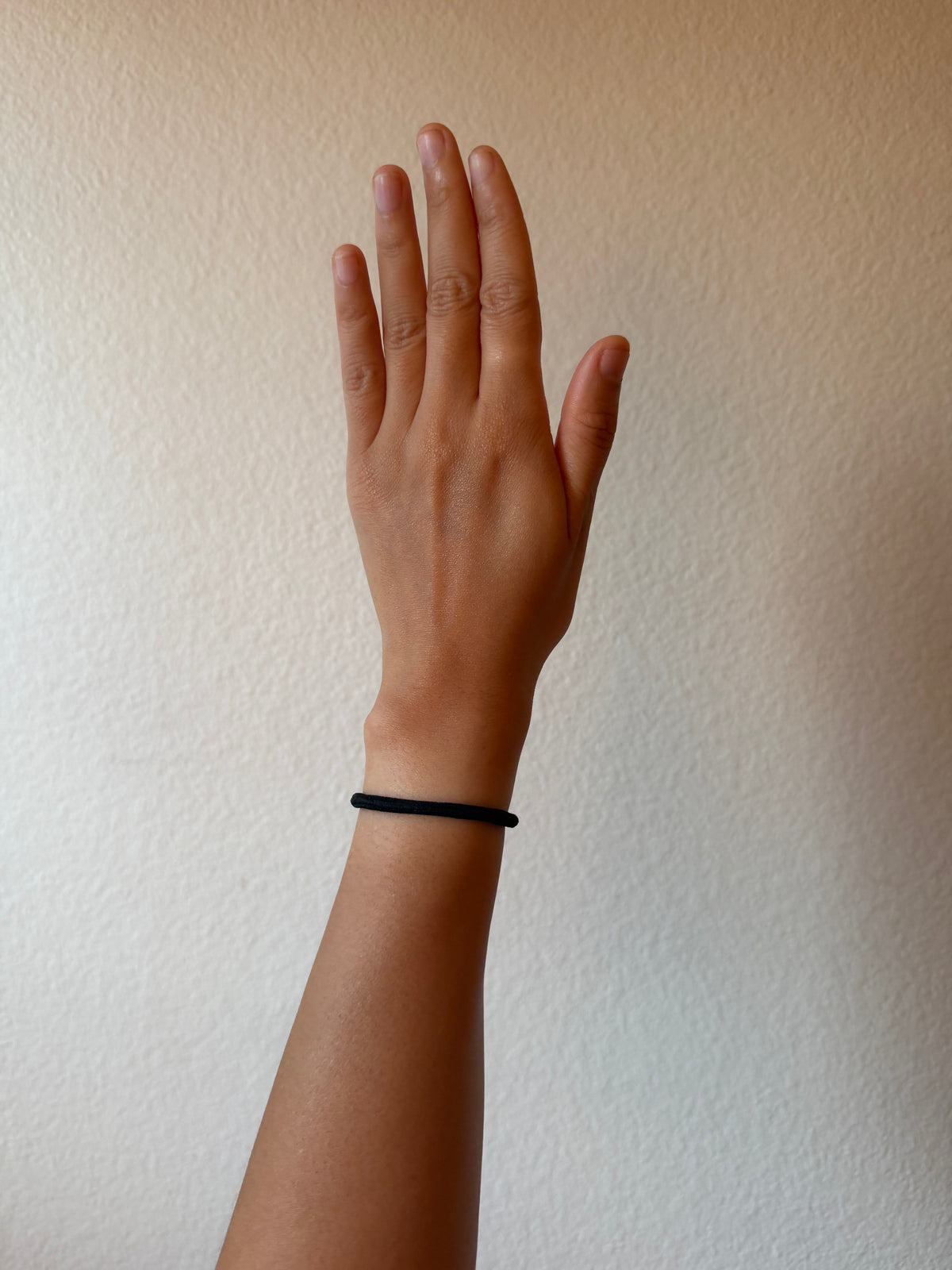 Is a Hair Tie on Your Wrist Bad for You? What to Know About Wartenberg's Syndrome